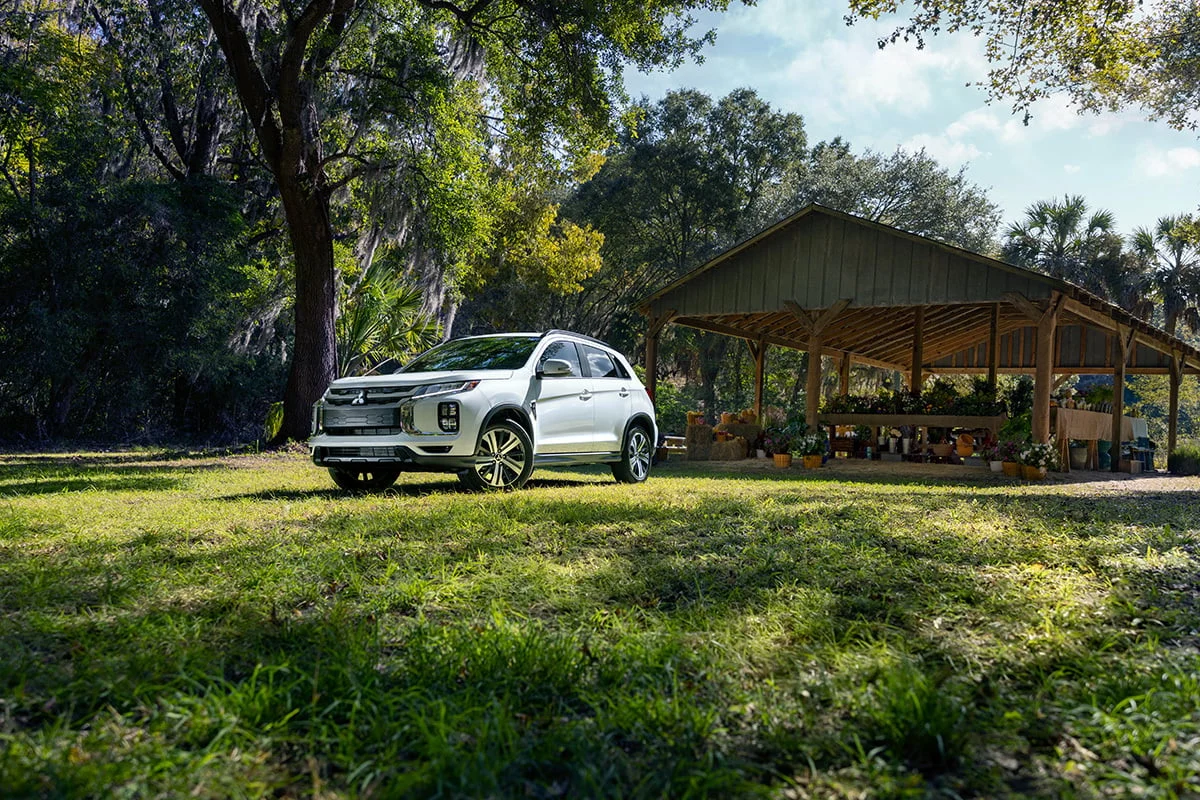 White Mitsubishi Outlander Sport angled profile